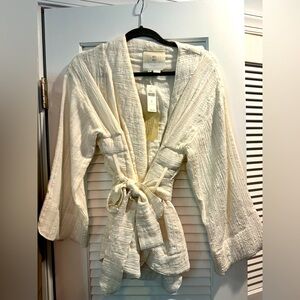 ANTHROPOLOGIE Cream wrap top. BNWT. Size M